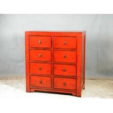 06004 . Red chest of drawers